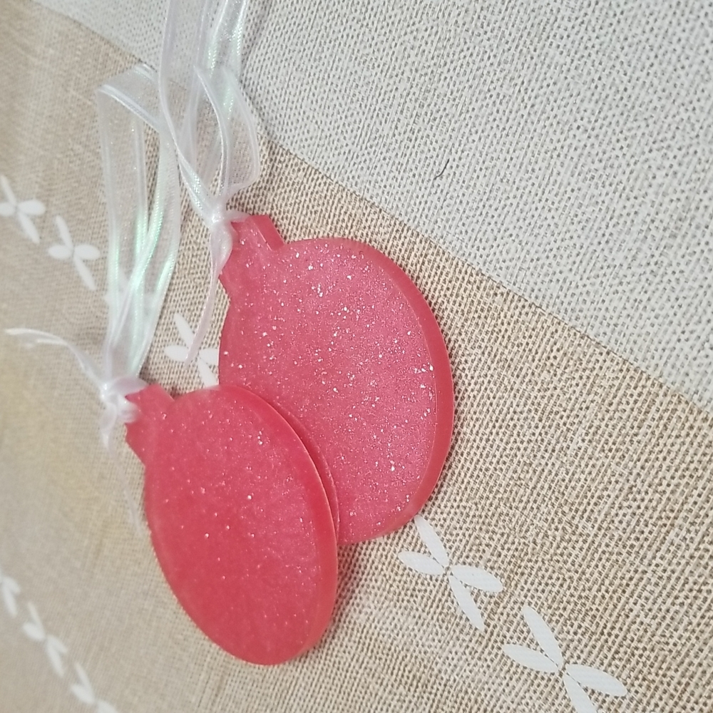 Handmade epoxy/resin ornament set.